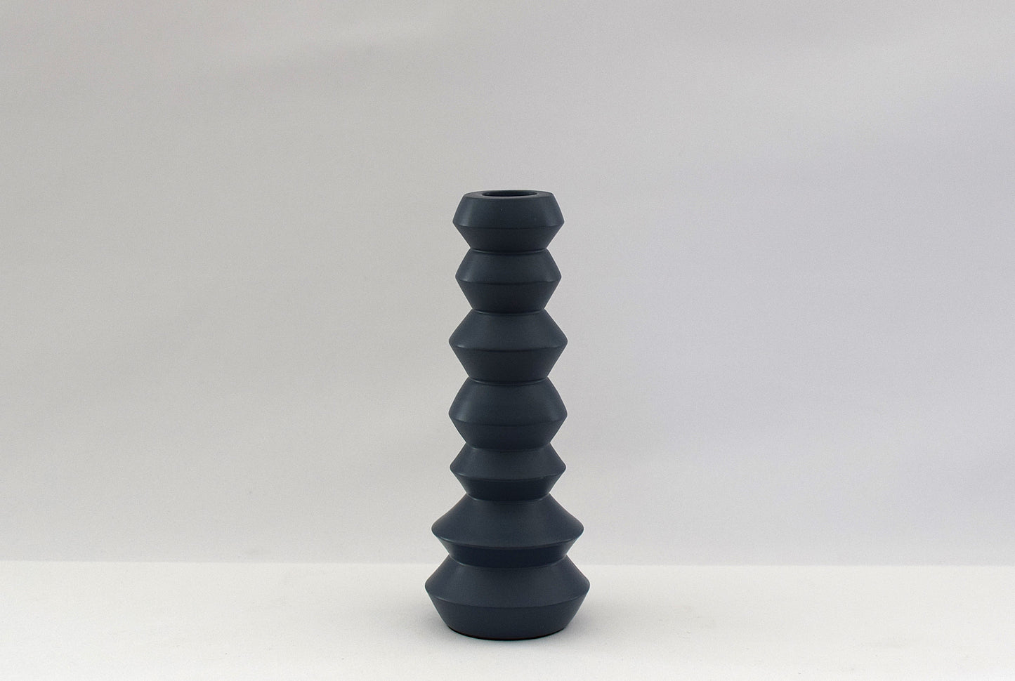 Bougeoir en métal bleu gris