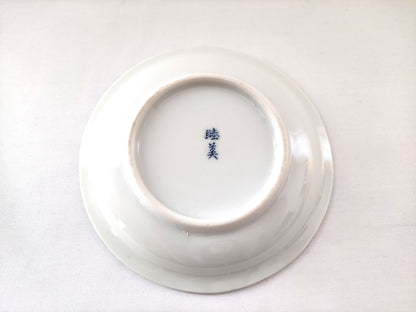 Petite assiette bleue à fleurs roses en porcelaine