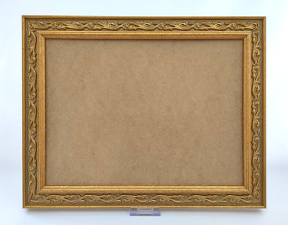 Cadre doré à moulures